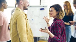 Two people talking at a Mental Health First Aid Course